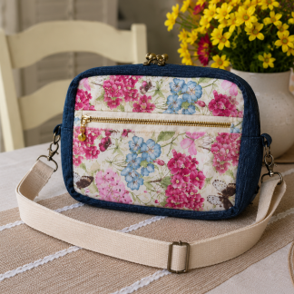 Handmade floral cotton shoulder bag with front zipper pocket and adjustable crossbody strap