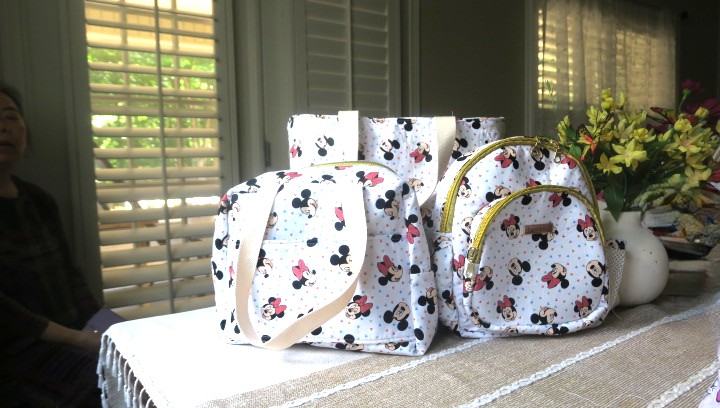 Handmade 3-piece matching bag set featuring a tote bag, shoulder bag, and backpack displayed together on a table.