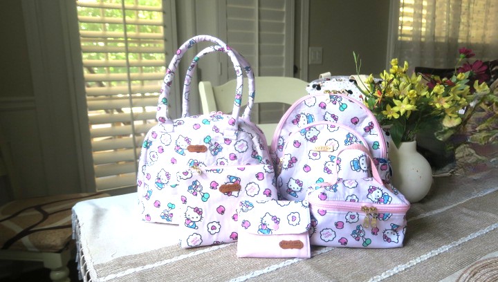 Handmade matching bag set featuring coordinated floral backpack, shoulder bag, lunch bag, cosmetic pouch, and small accessory purse.