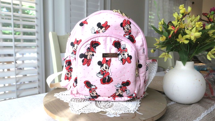 Handmade floral mini backpack featuring elegant beautiful patterns, quilted stitching, and boutique-style craftsmanship.