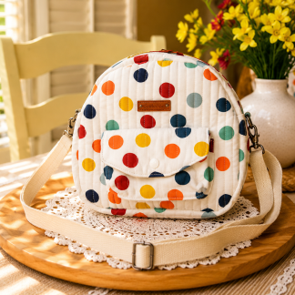 Handmade colorful polka dot shoulder bag with adjustable strap and quilted cotton design