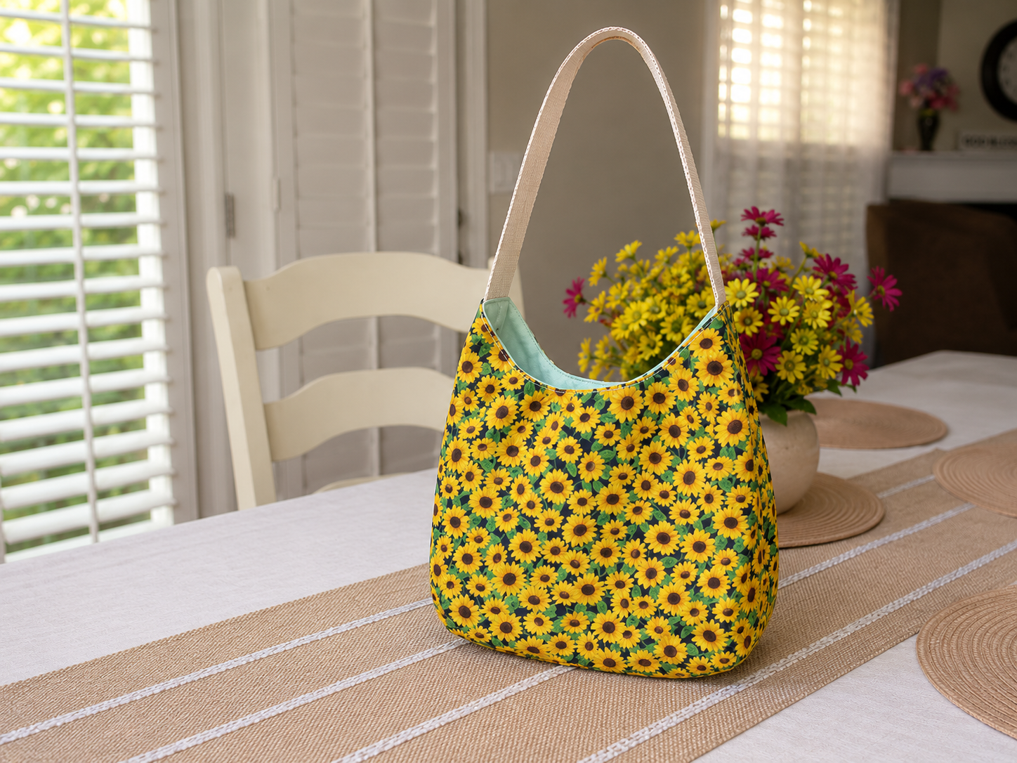 Handmade sunflower shoulder bag with soft cotton fabric and relaxed hobo-style design